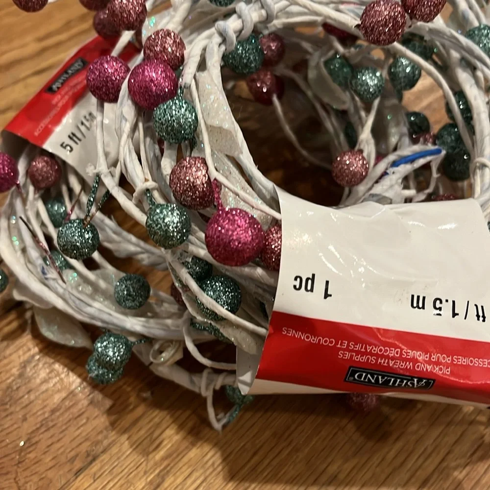 Bundle of two new, 5 foot Christmas, Noel coiled garland